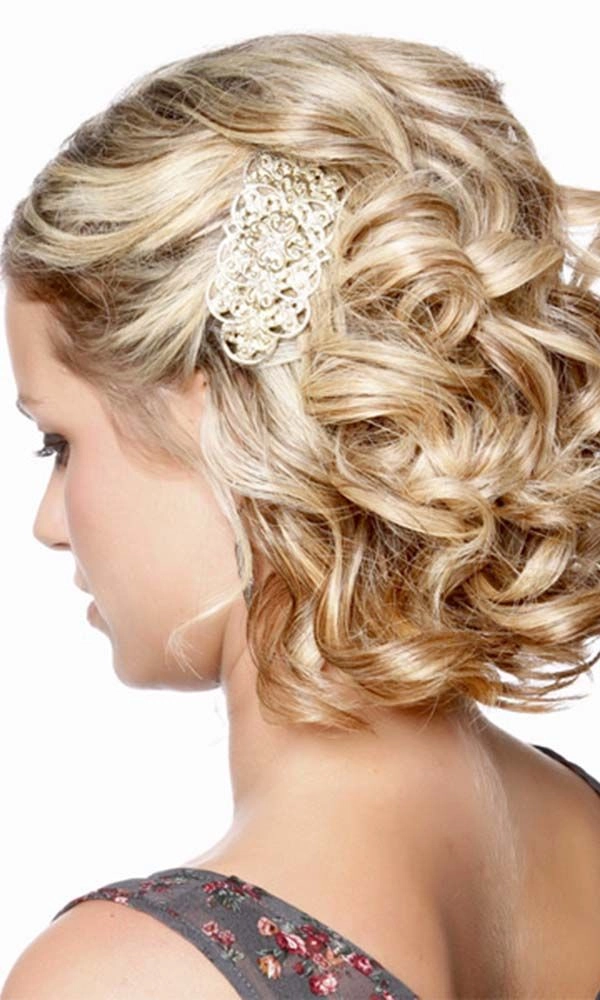 Elegant wedding hair styled for short layers with soft curls and delicate accessories