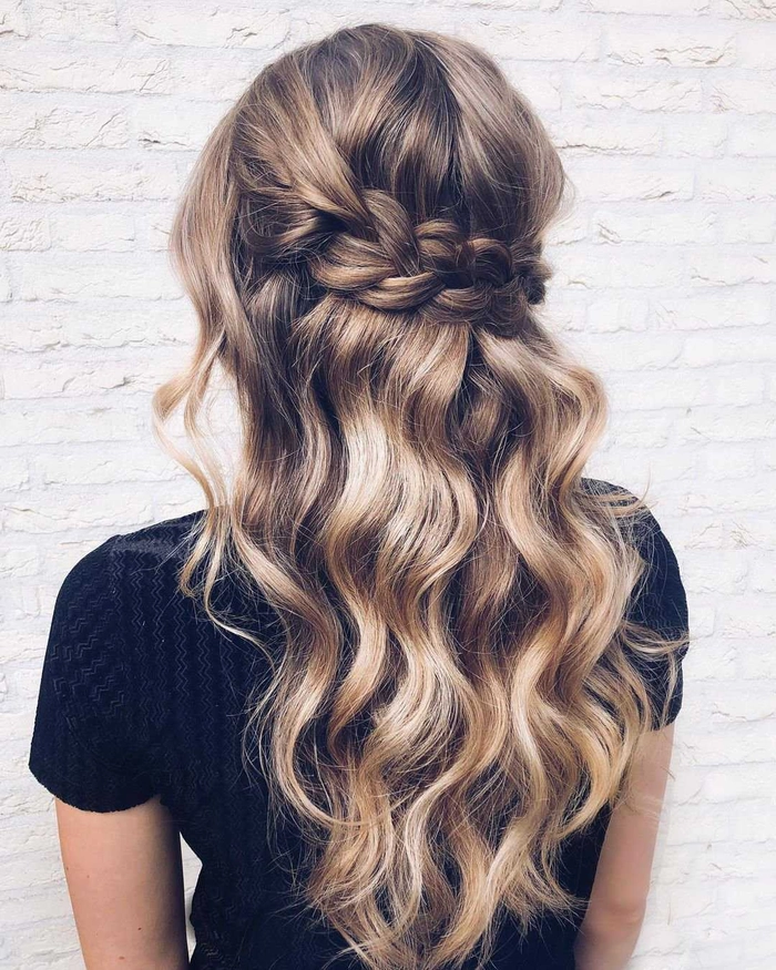 Beautiful hairstyle inspiration for summer wedding guests in warm weather settings Elegant summer wedding guest hair styled with soft waves and floral accessories