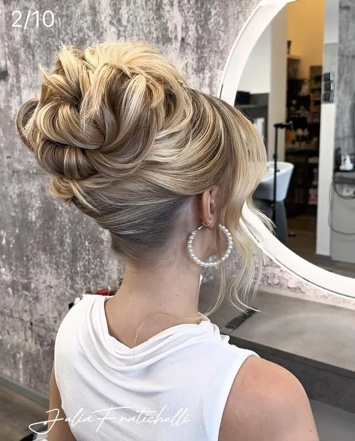 Chic and timeless wedding hairstyle for mature brides perfect for a sophisticated look Elegant updo wedding hairstyle for older brides with soft curls and floral accessories