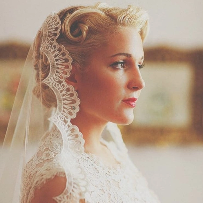 Classic bridal hairstyle perfect for timeless vintage wedding looks Elegant s vintage wedding hair styled with soft curls and delicate accessories