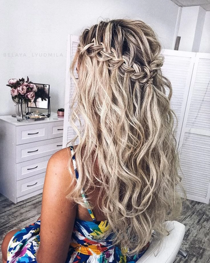 Beautiful waterfall braid hairstyle perfect for wedding celebrations and bridal looks Elegant waterfall braid wedding hair styled for a bride on her special day