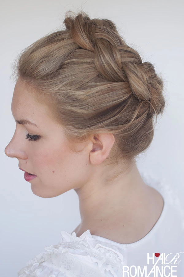 Beautiful bridal hairstyle featuring a classic braided crown for weddings Elegant wedding hair braided crown styled for a bride on her special day
