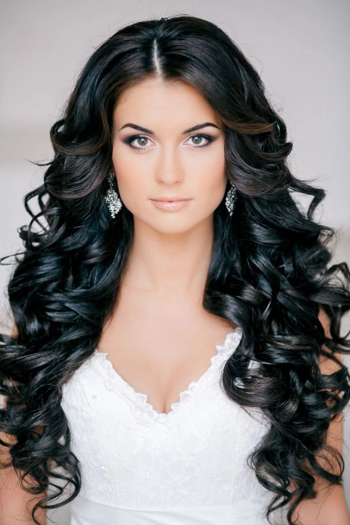 Beautiful bridal look showcasing thick coarse hair wedding styles at their best Elegant wedding hairstyle for thick coarse hair with intricate braids