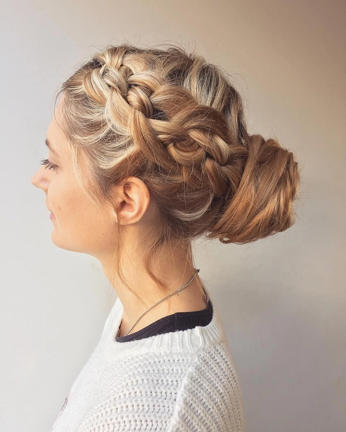 Beautiful bridal hairstyle featuring a sophisticated knot updo for weddings Elegant wedding hair knot updo with delicate floral accents