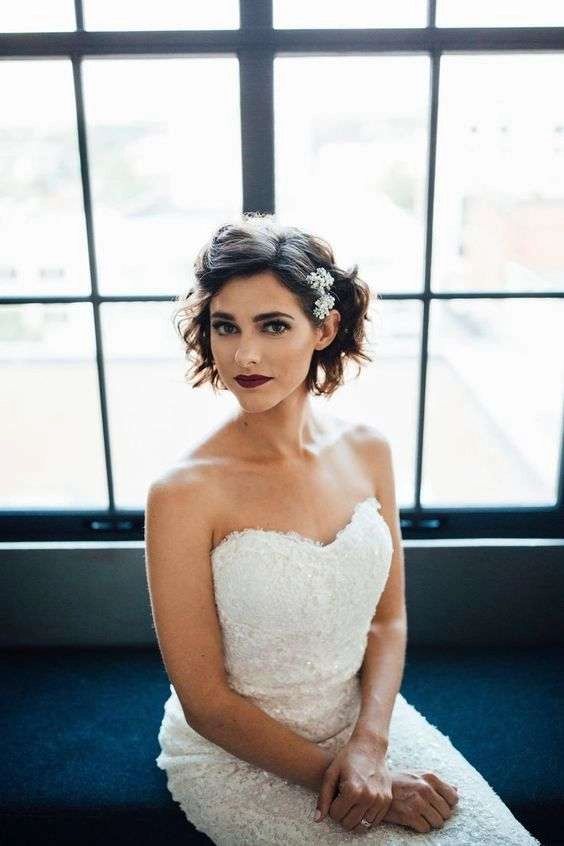 Elegant wedding hair styled for short layered cuts with delicate accessories