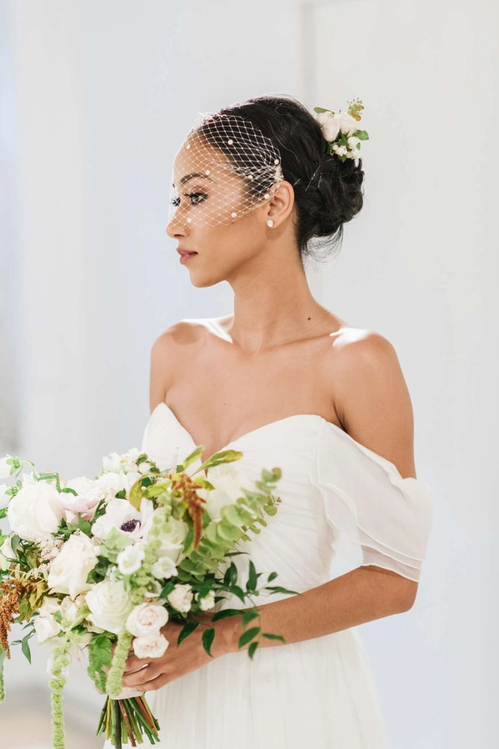 Wedding hairstyle inspiration for strapless dress look number 6 Elegant wedding hair styled for a bride wearing a strapless dress
