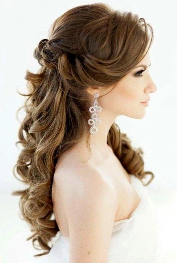 Sophisticated wedding hairstyle perfect for mature brides on their special day Elegant wedding hairstyle for older brides showcasing soft waves and a floral accessory