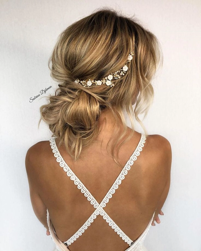 Wedding Hair for Backless Dress Style Inspiration Image 7 Elegant wedding hairstyle showcasing loose curls perfect for a backless dress