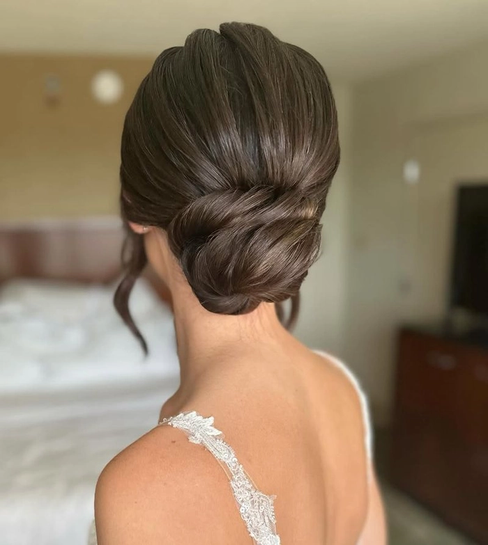 Chic and timeless wedding hairstyles for older brides inspiration image 8 Elegant wedding hairstyle for older brides with soft curls and delicate accessories