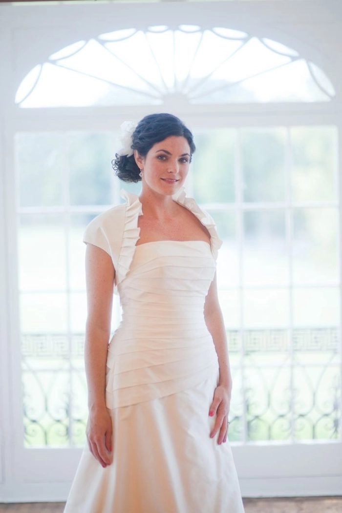Thick coarse hair wedding style 11 showcasing a romantic bridal look Elegant wedding hairstyle for thick coarse hair featuring soft waves and floral accents