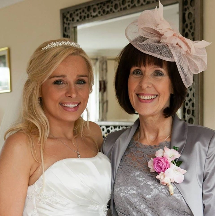 Timeless wedding hairstyle ideas perfect for mature brides on their special day Elegant wedding hairstyles for older brides with soft curls and floral accents