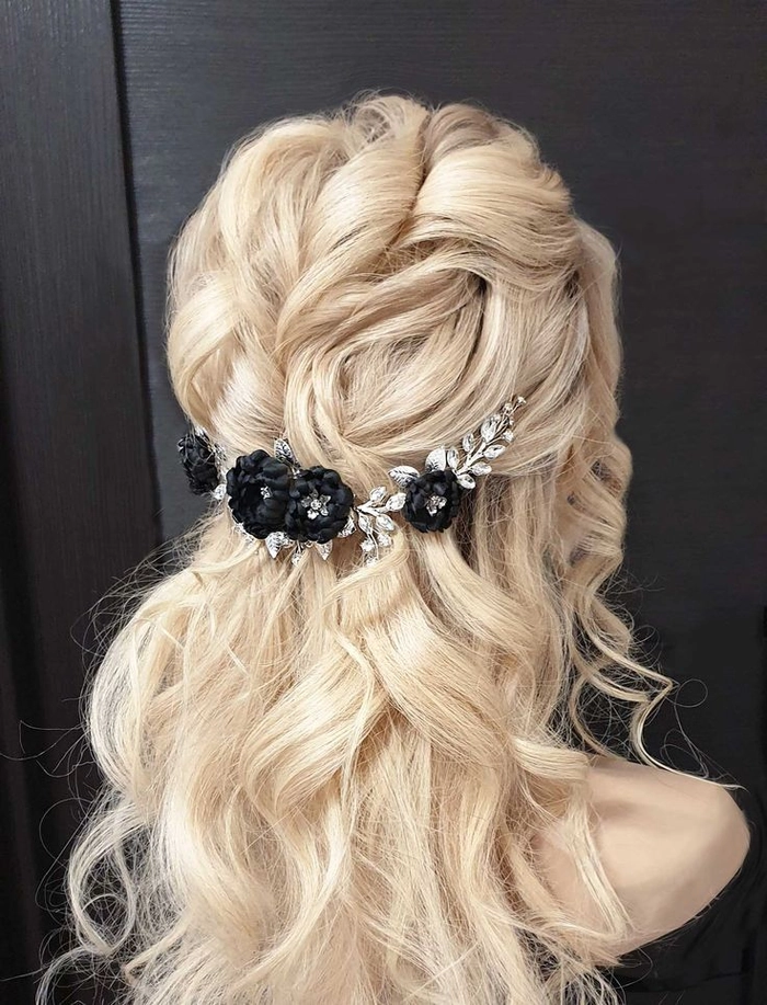 Sophisticated gothic bridal hairstyle for a wedding day look perfect for the modern bride Elegant gothic wedding bridal hair adorned with intricate dark floral accessories