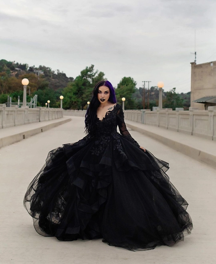 Gothic inspired bridal hairstyle for a dramatic wedding look Elegant gothic wedding bridal hair with intricate black lace accessories