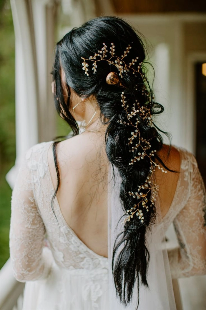 Gothic wedding bridal hair inspiration with dramatic styling and unique accessories Elegant gothic wedding bridal hair styled with intricate details and dark floral accents