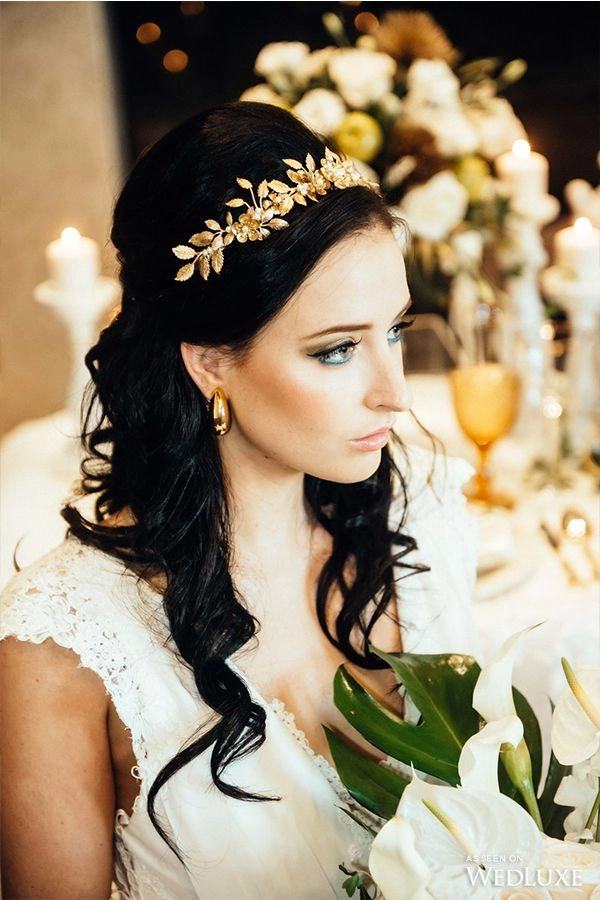 Bride styled with Greek wedding hair adorned by an olive wreath for an elegant look