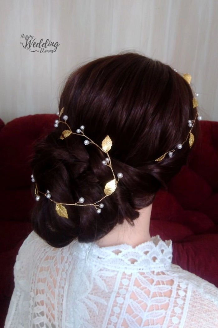 Elegant Greek wedding hair styled with an olive wreath for a classic bridal look