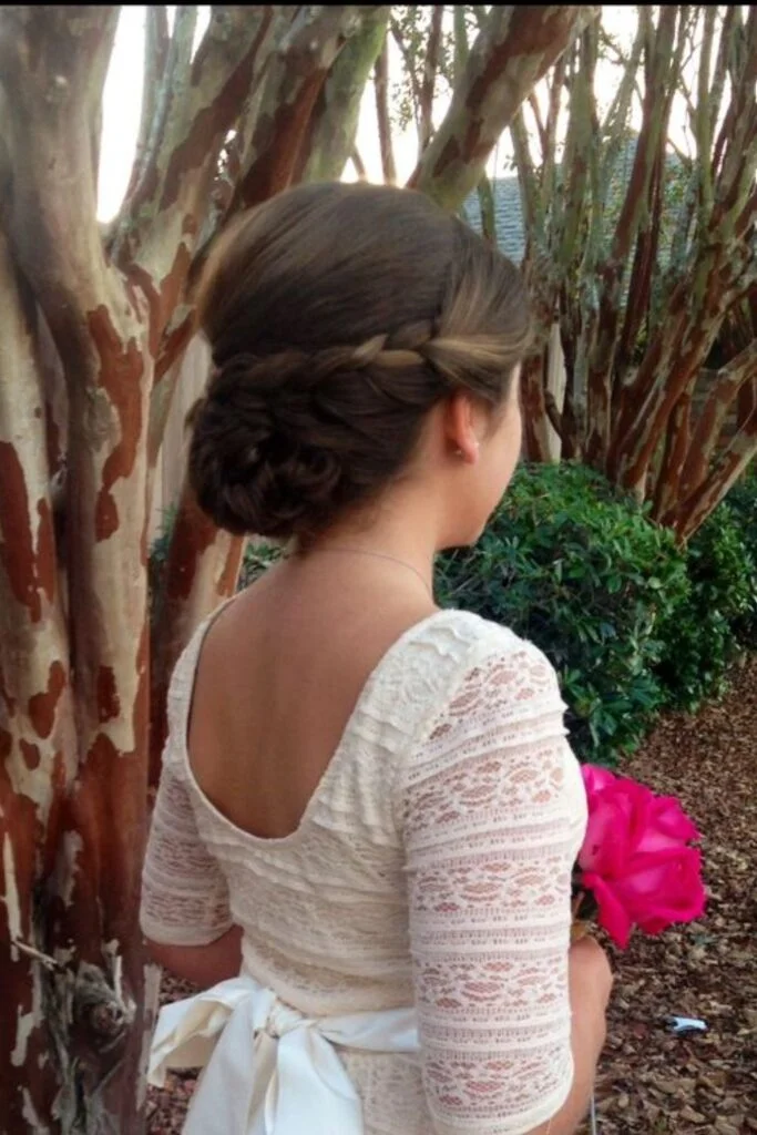 Elegant and easy junior bridesmaid hairstyles perfect for weddings Junior bridesmaid simple hairstyles featuring soft curls and floral accessories