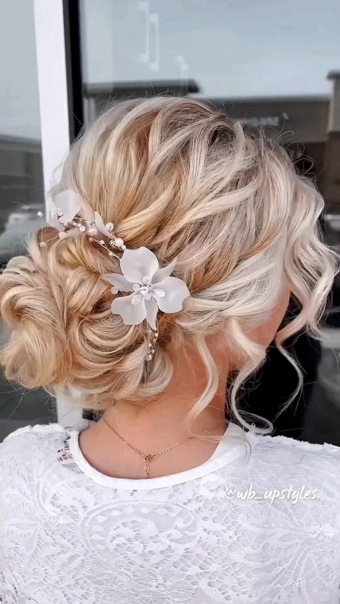 Wedding Hairstyles image messy textured low bridal updo image