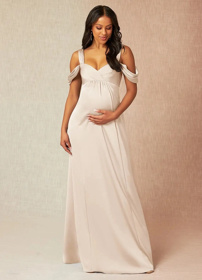 Elegant wedding hairstyle for a radiant and comfortable pregnant bride Pregnant bride smiling with a comfortable and elegant wedding hairdo