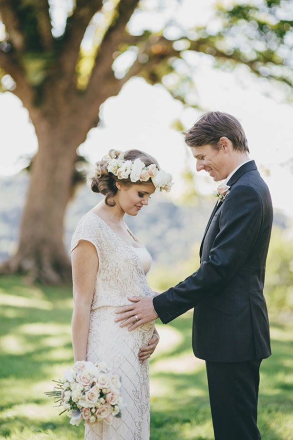 Beautiful and practical wedding hair for a glowing pregnant bride Pregnant bride with a comfortable and elegant wedding hairstyle on her special day