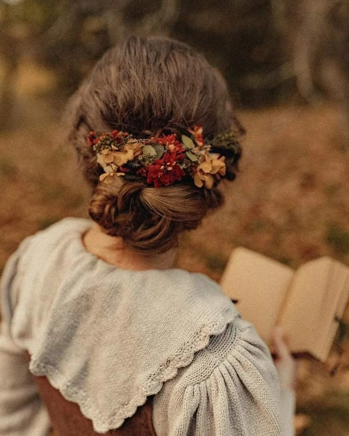Soft romantic cottagecore wedding hair styles with floral accents