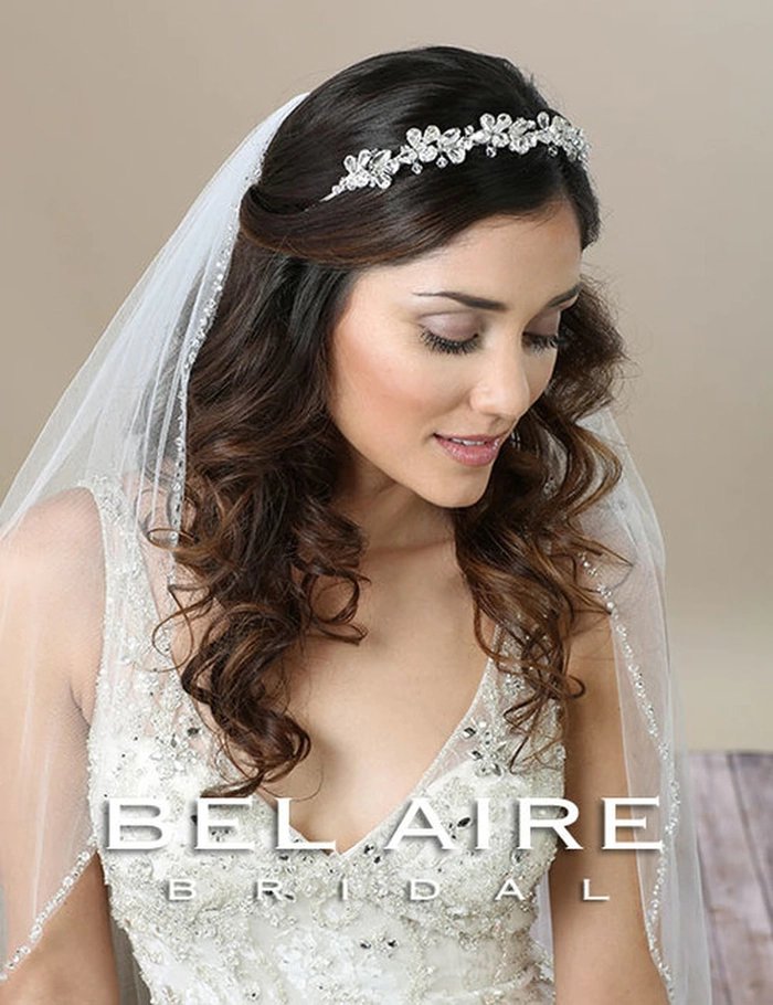 Beautiful hairstyle inspiration for a bride's second wedding day look Elegant second wedding bridal hair styles featuring soft curls and delicate accessories