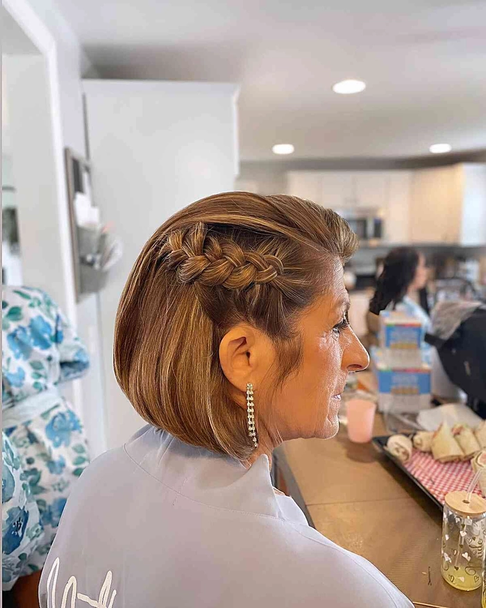 Elegant short bob wedding hairstyles perfect for modern brides on their special day Short bob wedding hairstyle featuring delicate floral accessories for brides