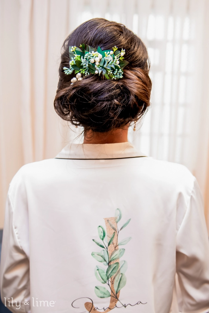 Spring garden wedding hairstyle featuring delicate floral hair accessories
