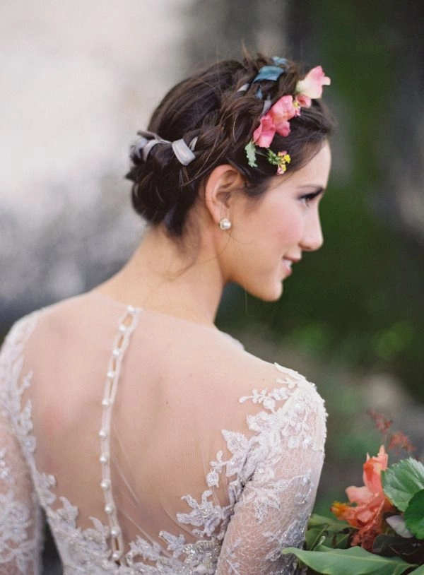 Spring garden wedding hairstyle featuring delicate floral hair accessories