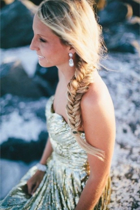 Humidity-proof bridal hair look perfect for a summer beach wedding ceremony Summer beach wedding hairstyle designed to resist humidity and stay flawless