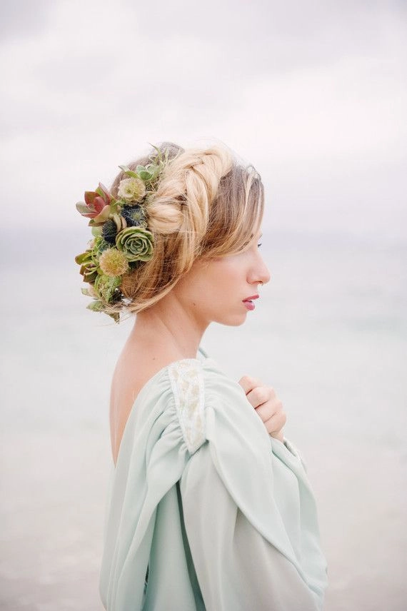 Tropical wedding hairstyle perfect for a beach destination celebration Elegant destination tropical wedding hair styled with vibrant flowers