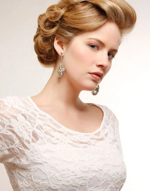 Victorian era inspired bridal hair with intricate braids and delicate floral accents