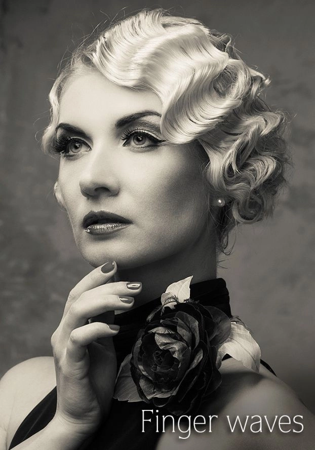 Bride showcasing vintage 1920s finger waves wedding hair in an elegant bridal look
