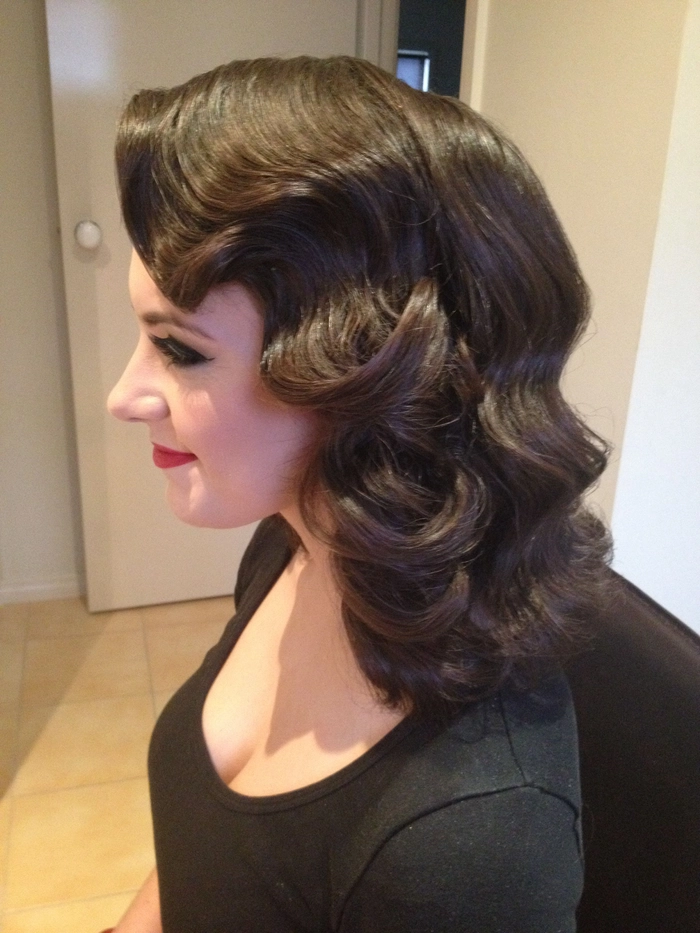 Vintage 1920s finger waves styled wedding hair with elegant accessories