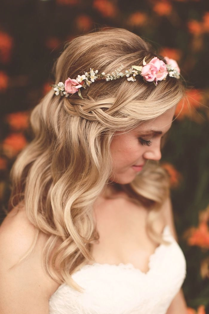 Beautiful bridal hairstyle featuring a delicate waterfall braid for weddings Elegant waterfall braid wedding hair styled for a bride