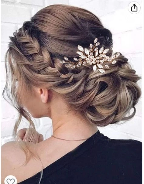Beautiful medium-length hair styled perfectly for a wedding guest occasion Elegant wedding guest hairstyle for medium hair with soft curls and subtle volume