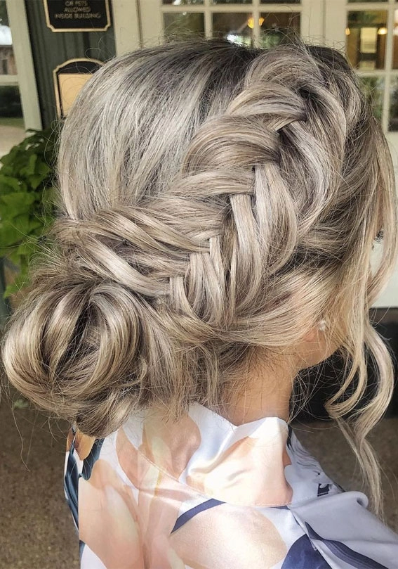 Sophisticated fishtail braid updo perfect for wedding hairstyles collection image 8 Elegant wedding hair fishtail braid updo styled for a bride on her special day