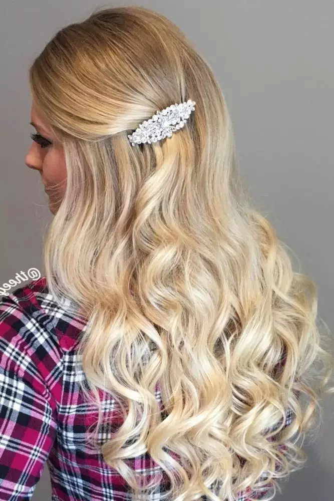 Close-up of barrette stacking technique for medium length office hairstyle