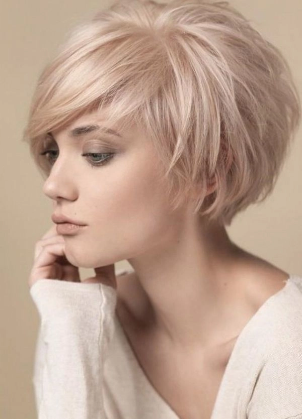 Elegant short bob work hairstyle for business casual office settings Business casual short bob hairstyle with sleek side part for a professional look