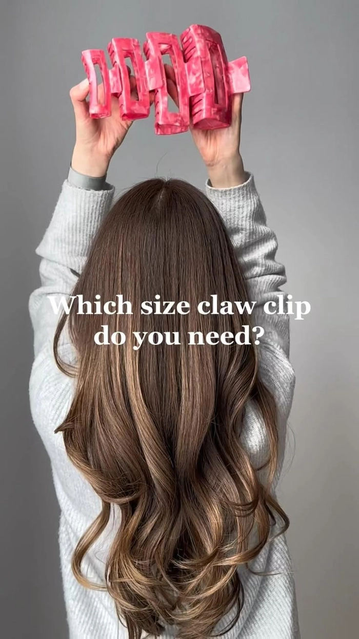 Claw clip size comparison chart for thick hair styled into a professional work updo