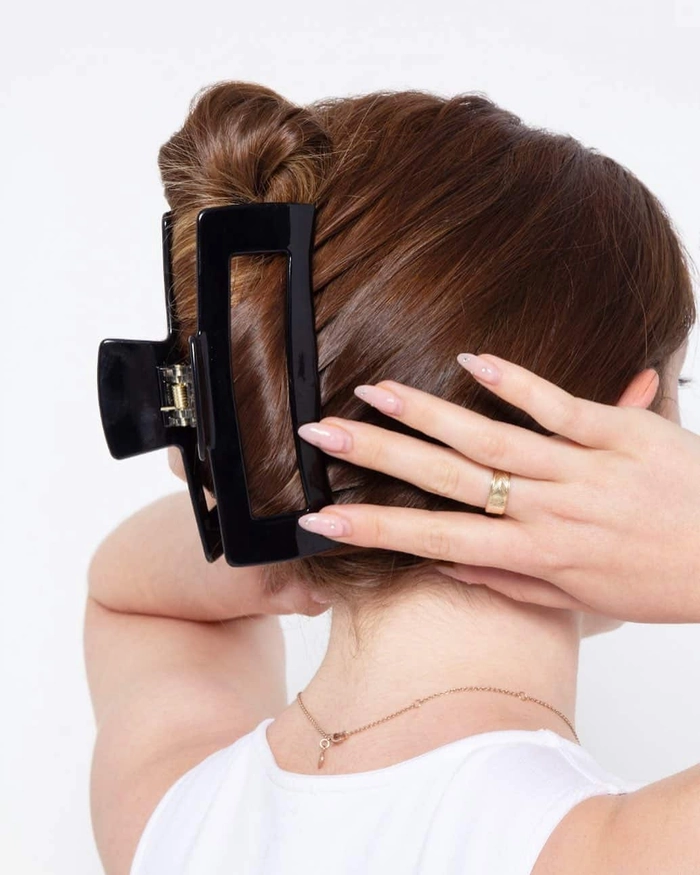 Quick claw clip updo for corporate casual Friday hairstyle