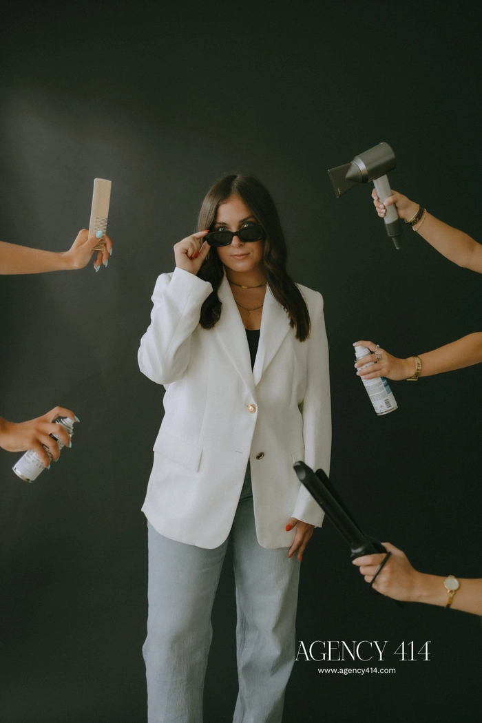Creative Agency Hair Trends - Work Hairstyle for Fashion Professionals Fashion professionals at a creative agency model a trendy, polished work hairstyle with sleek waves