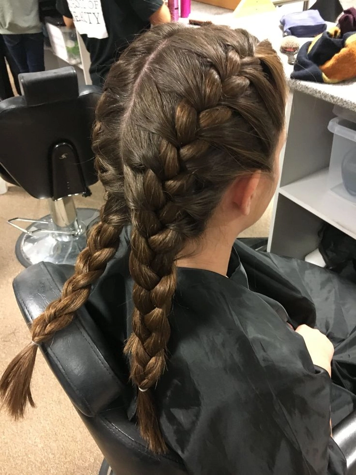 Double dutch braids keeping hair secure and neat for active work tasks