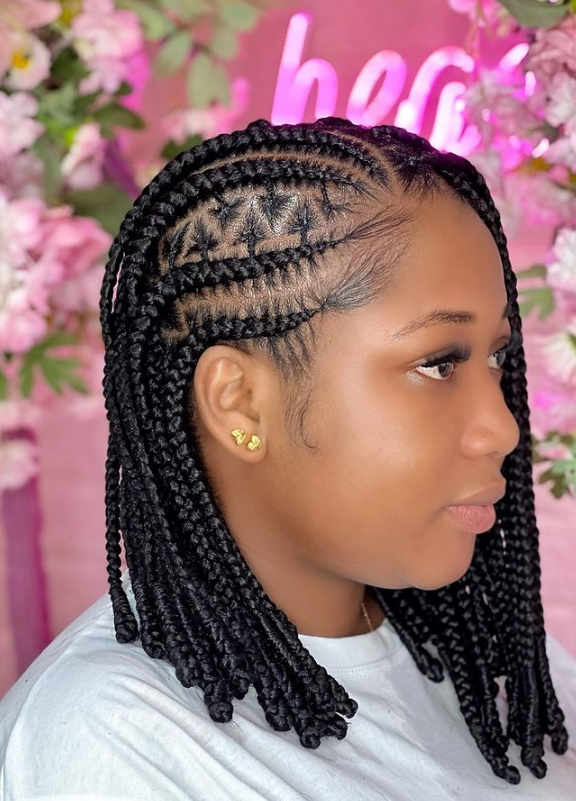 Sophisticated braid out style ideal for work settings Elegant braid out hairstyle on a professional Black woman with defined curls and a refined finish