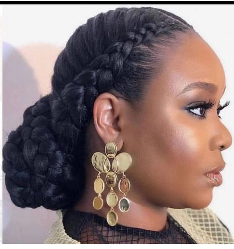 Elegant Braid Out for Professional Black Women - Work Hairstyle Idea African American woman with elegant braid out hairstyle in professional office setting, looking confident