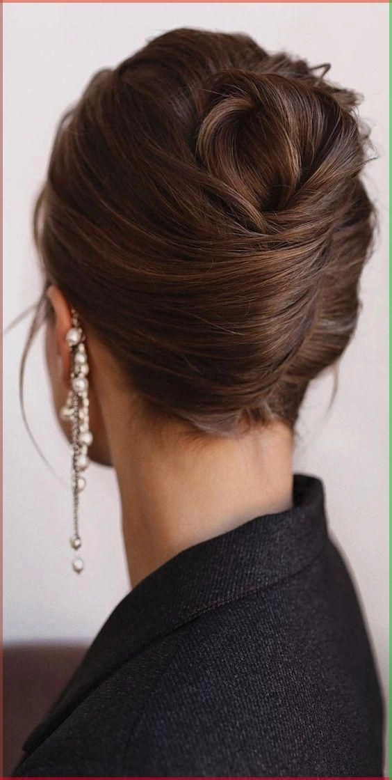 Elegant French Twist Variations for Corporate Events - Work Hairstyle Number 2 Elegant French twist variation for corporate events, styled with sleek side sections and a polished finish