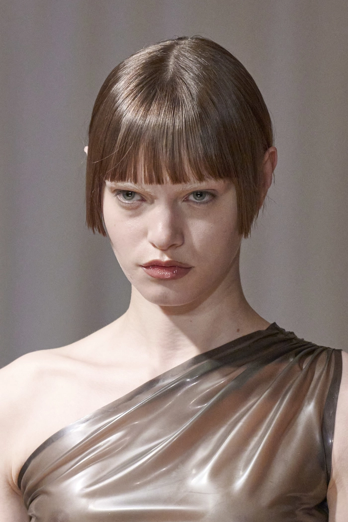 Forehead covering professional fringe hairstyle for a polished work look