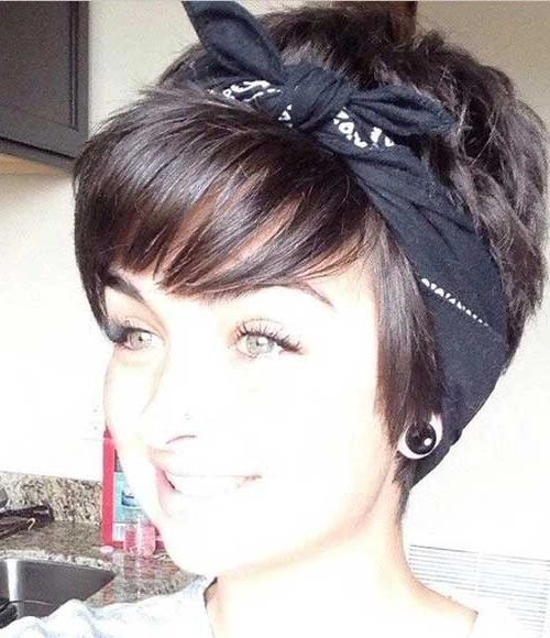 Short haircut with headband integration ideal for professional office environments Headband styling seamlessly incorporated into a short office haircut for a polished work look