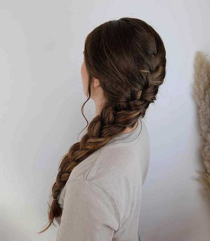 Sleek low ponytail hairstyle perfect for the professional office environment Professional office hairstyle for long hair with a sleek low ponytail