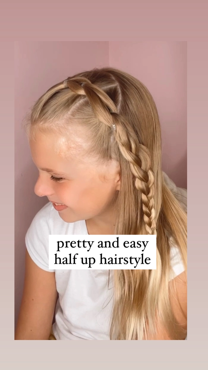 A professional woman with a sleek minimalist half up half down hairstyle, suitable for work, with a polished and understated look